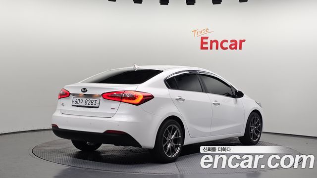Kia K3 2013 — photo 2