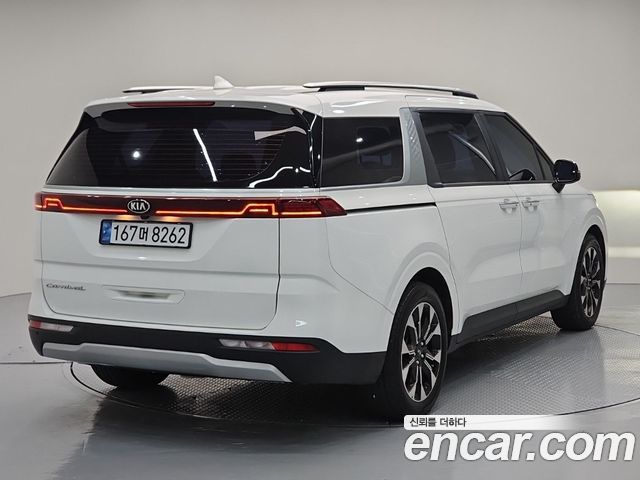 Kia Canival 2021 — photo 2