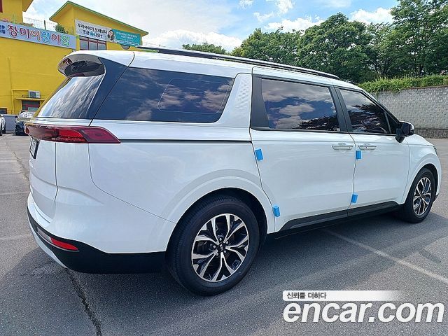 Kia Canival 2021 — photo 2