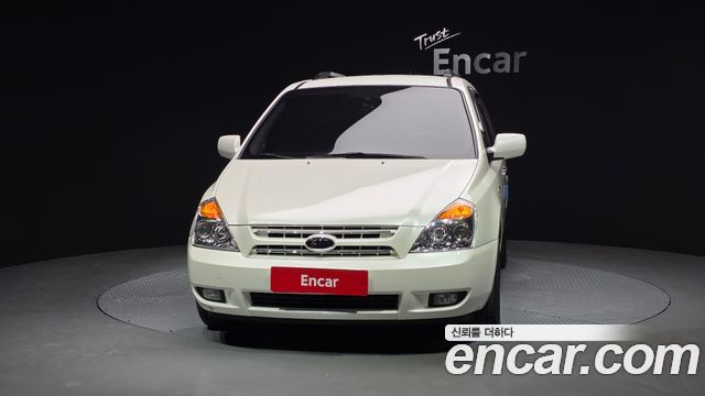 Kia Canival 2010 — photo 3