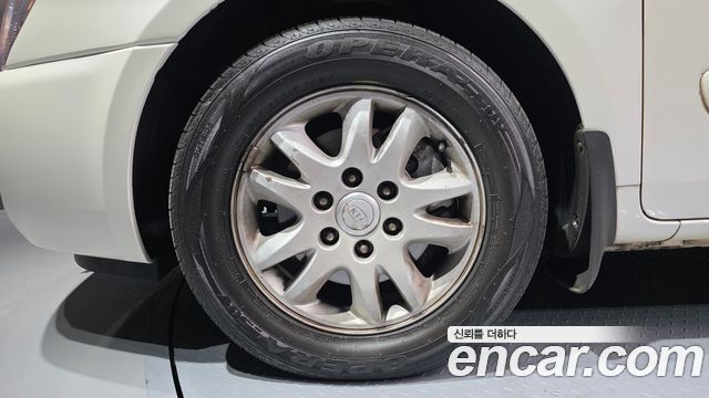 Kia Canival 2010 — photo 5