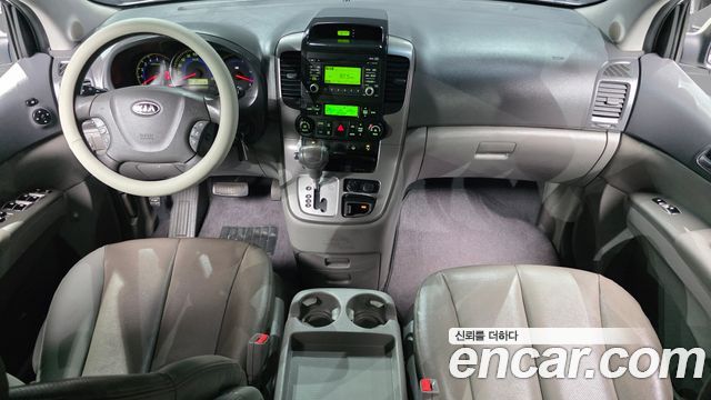 Kia Canival 2010 — photo 7