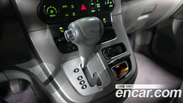 Kia Canival 2010 — photo 9