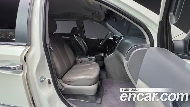 Kia Canival 2010 — photo 10
