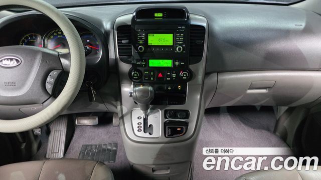 Kia Canival 2010 — photo 15