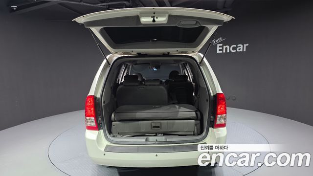 Kia Canival 2010 — photo 20