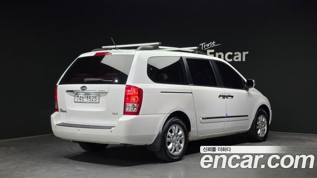 Kia Canival 2012 — photo 2