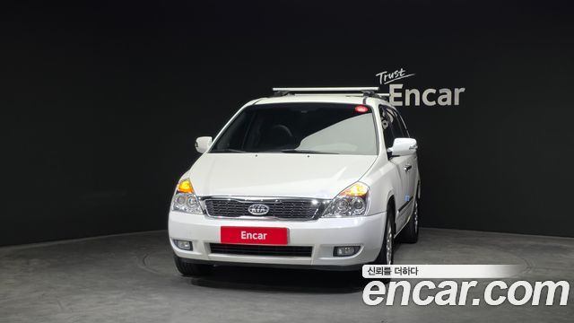 Kia Canival 2012 — photo 3