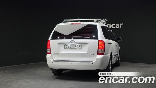 Kia Canival 2012 — photo 4