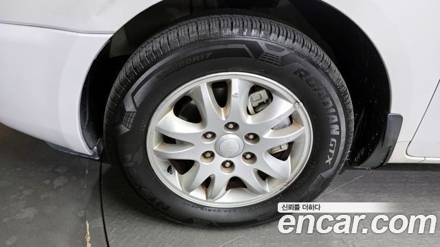 Kia Canival 2012 — photo 5