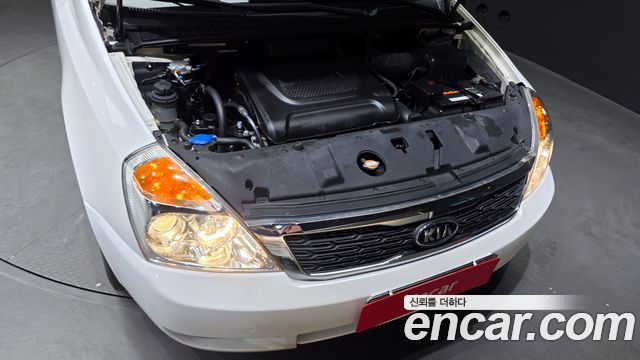 Kia Canival 2012 — photo 6
