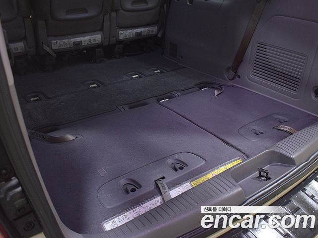 Kia Canival 2010 — photo 4