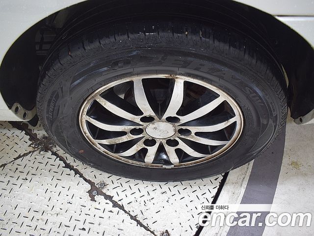 Kia Canival 2010 — photo 6
