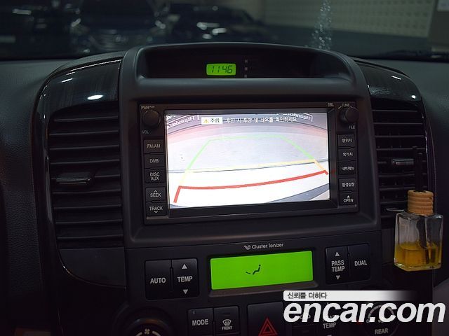 Kia Canival 2010 — photo 14