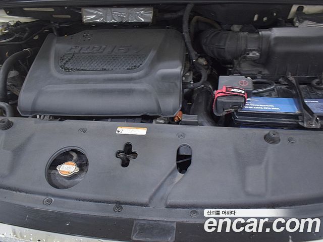 Kia Canival 2010 — photo 17
