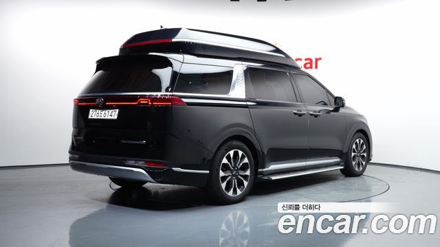 Kia Canival 2021 — photo 2