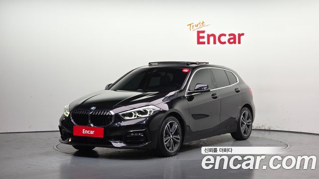 BMW 1-Series 2021 — photo 1