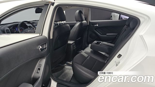 Kia K3 2014 — photo 18