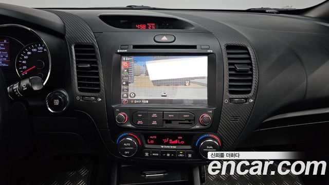 Kia K3 2014 — photo 20