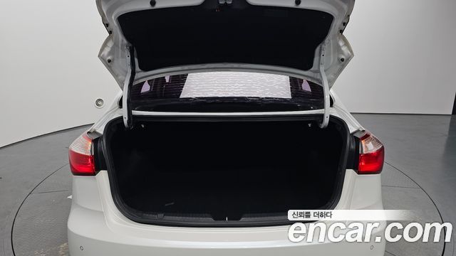 Kia K3 2014 — photo 26