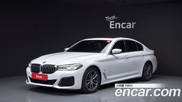 BMW 5-Series 2021 — photo 1