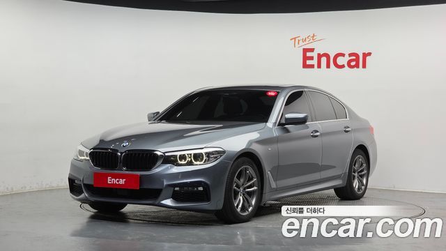 BMW 5-Series 2018 — photo 1