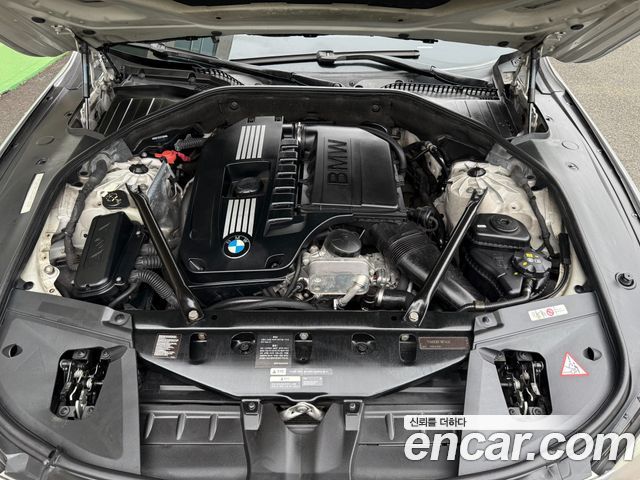 BMW 7-Series 2011 — photo 11