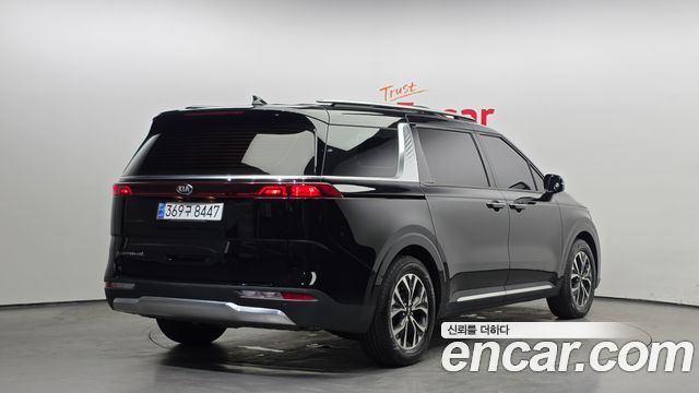 Kia Canival 2021 — photo 2