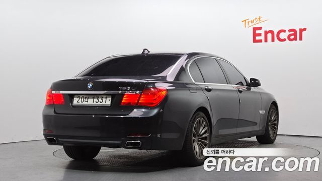 BMW 7-Series 2011 — photo 2