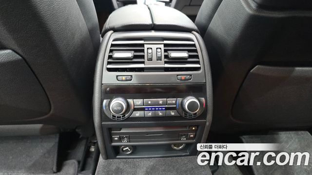BMW 7-Series 2011 — photo 19