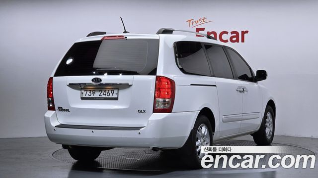 Kia Canival 2012 — photo 2