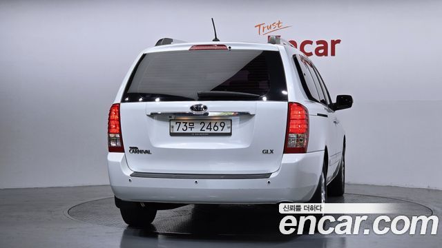 Kia Canival 2012 — photo 4