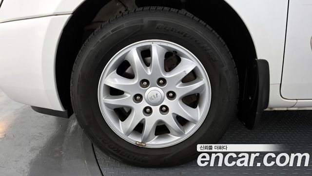 Kia Canival 2012 — photo 5
