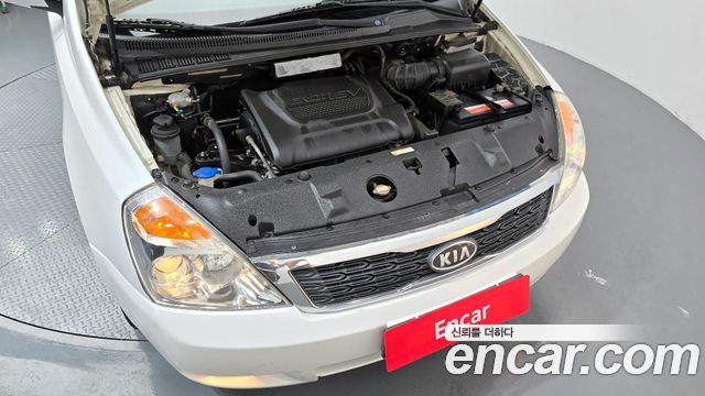 Kia Canival 2012 — photo 6