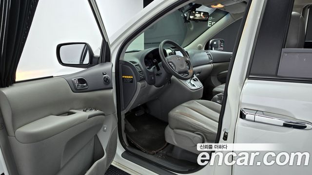 Kia Canival 2012 — photo 10