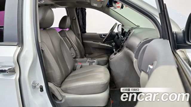 Kia Canival 2012 — photo 11