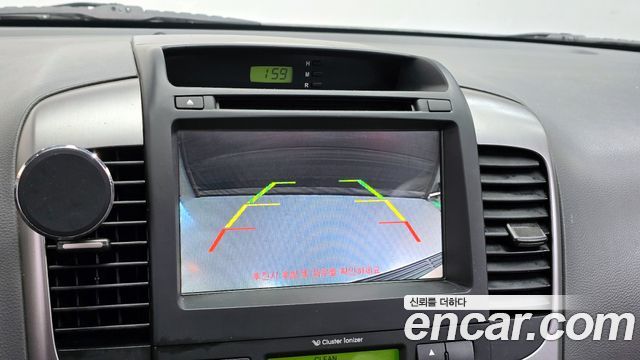 Kia Canival 2012 — photo 15