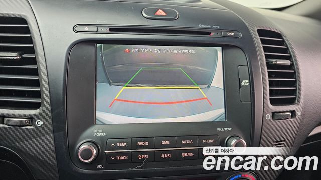 Kia K3 2013 — photo 20