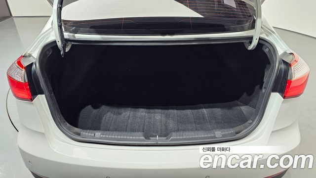 Kia K3 2013 — photo 26