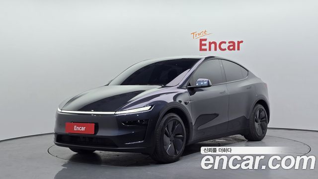 Tesla Model Y 2025 — photo 1