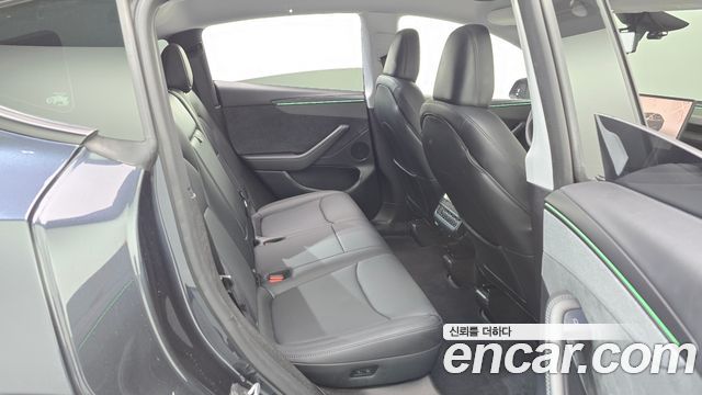 Tesla Model Y 2025 — photo 11