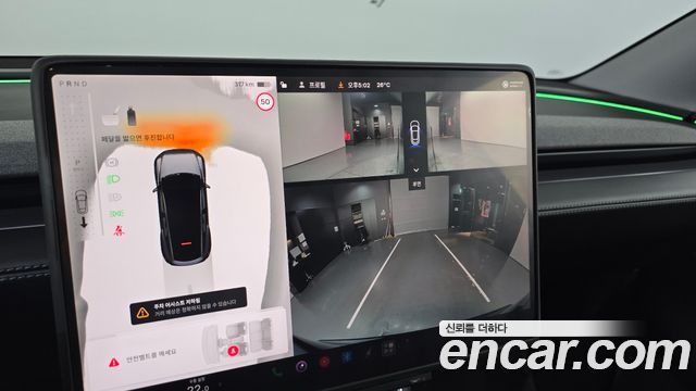 Tesla Model Y 2025 — photo 14