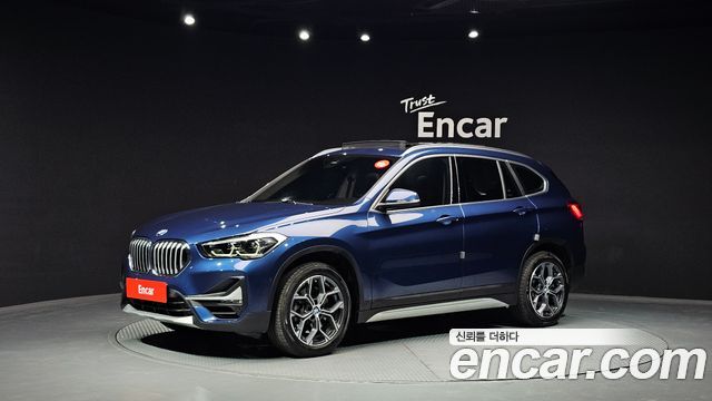 BMW X1 2021 — photo 1