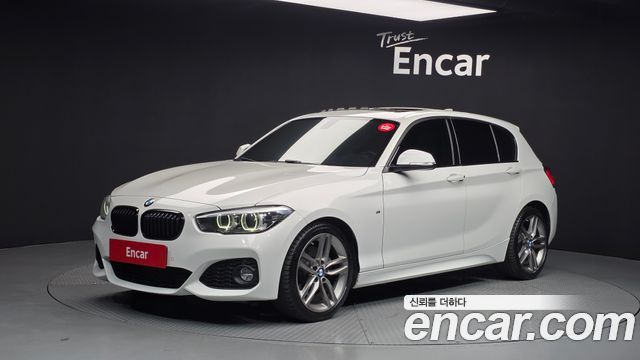 BMW 1-Series 2018 — photo 1