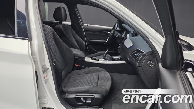 BMW 1-Series 2018 — photo 16