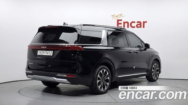 Kia Canival 2022 — photo 2
