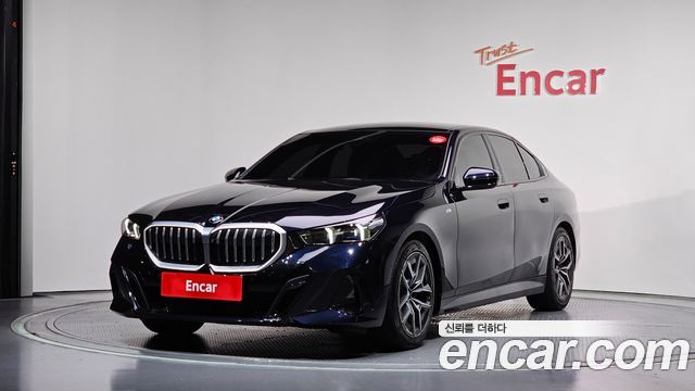 BMW 5-Series 2024 — photo 1