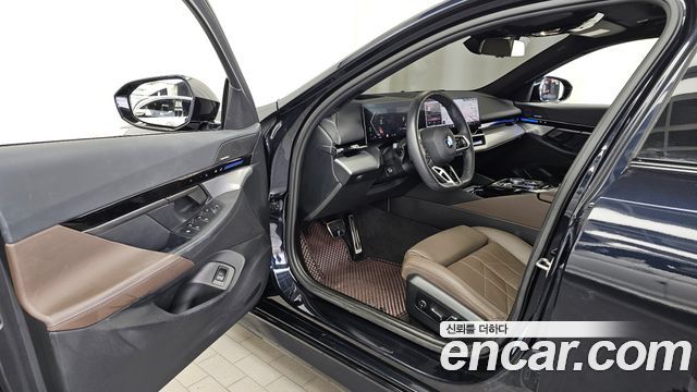 BMW 5-Series 2024 — photo 10