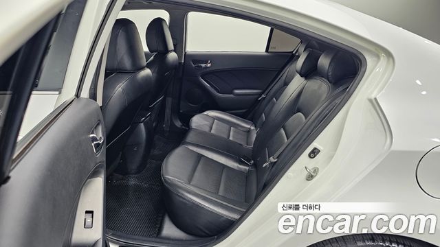 Kia K3 2013 — photo 17