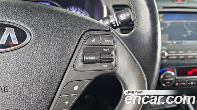 Kia K3 2013 — photo 21